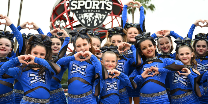 east celebrity elite cheerleaders posing outside of the espn wide world of sports complex at the summit cheerleading championship 2023